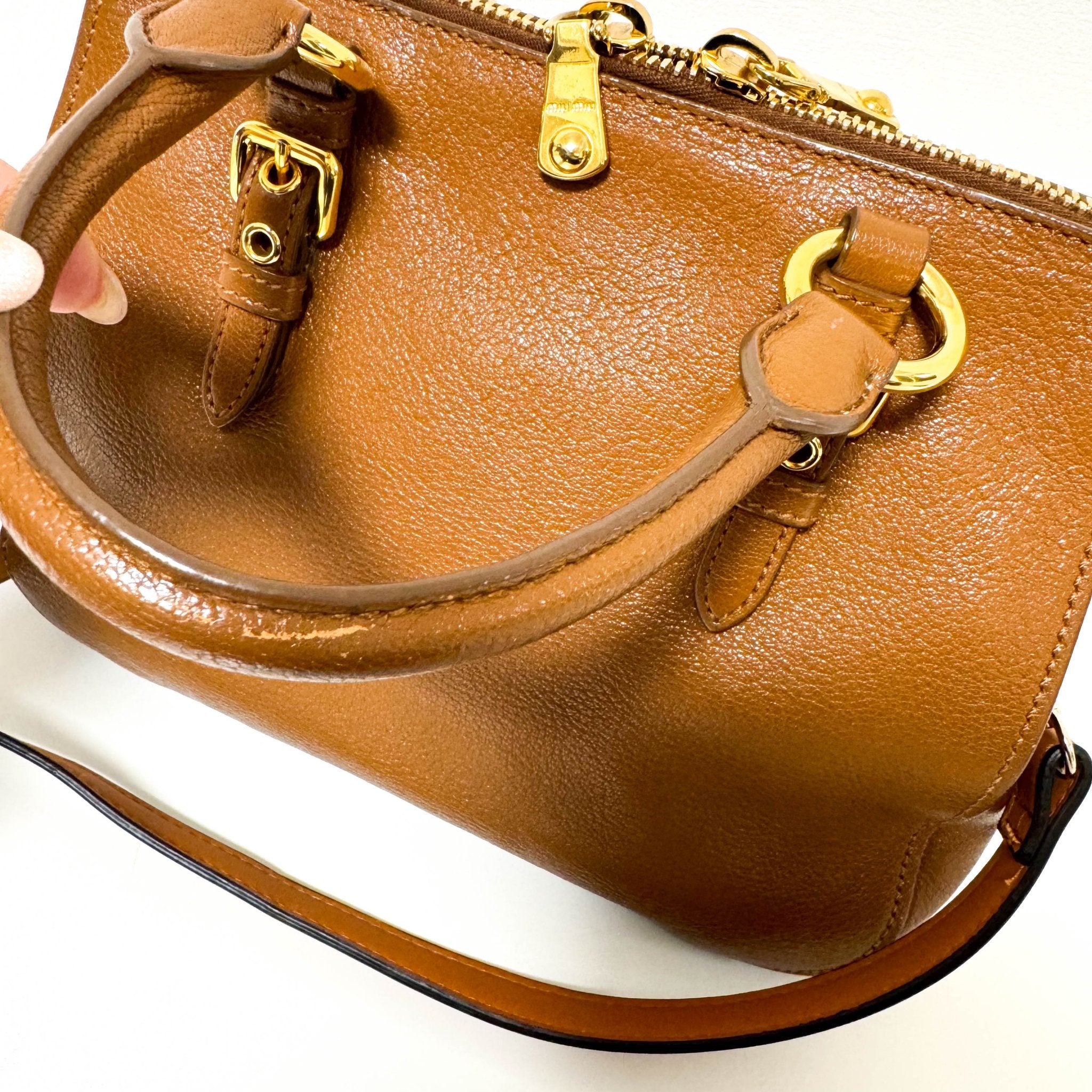 MIU MIU Vitello Caribu Brown Leather Top Handle Crossbody Bag, in , Sold by HIVE PRELOVED - Crossbody bags, Handle Bags,