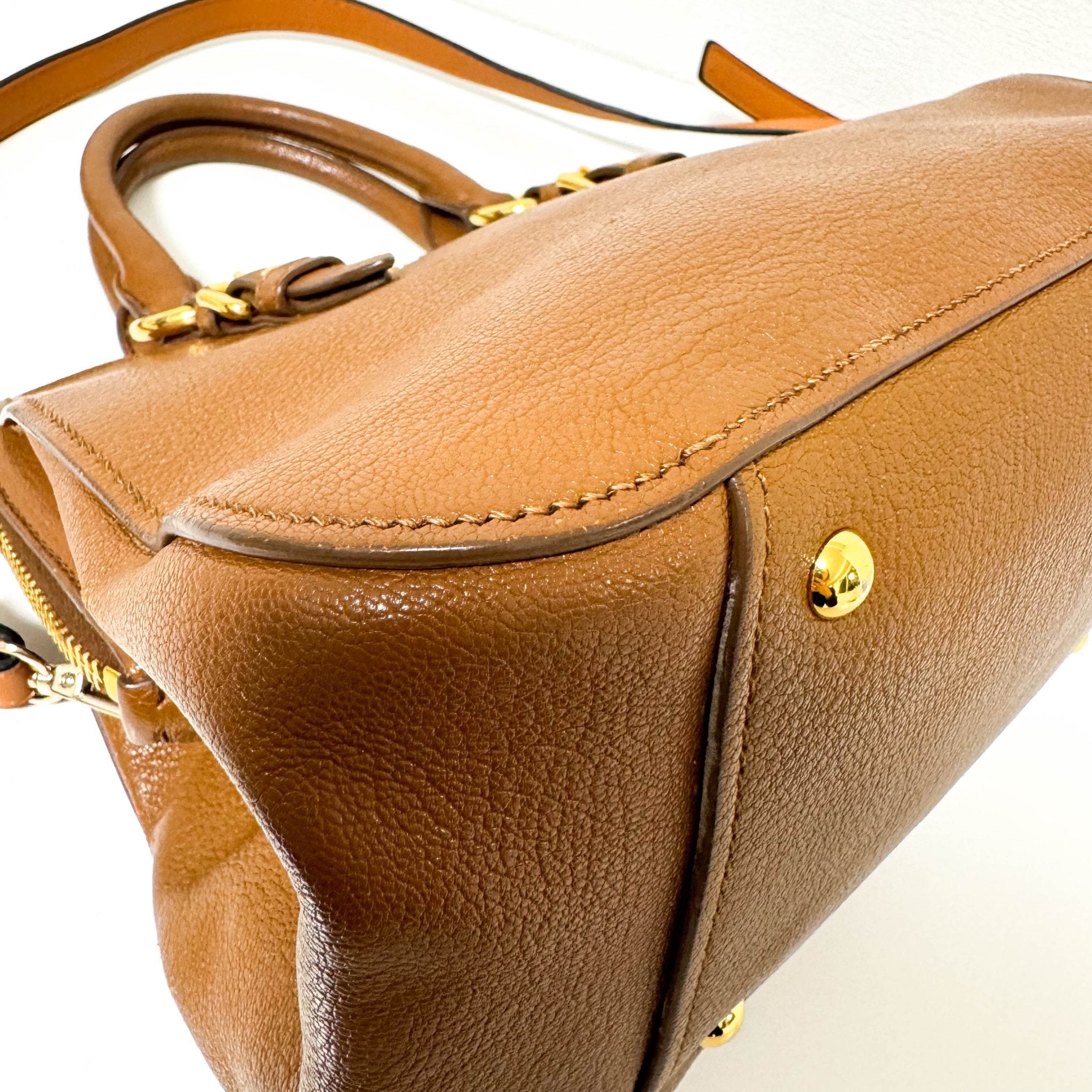 MIU MIU Vitello Caribu Brown Leather Top Handle Crossbody Bag, in , Sold by HIVE PRELOVED - Crossbody bags, Handle Bags,