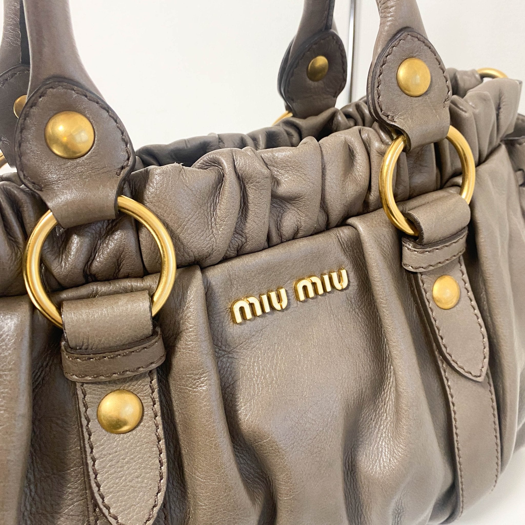 MIU MIU Vitello Lux Bauletto Leather Handbag Smoke Grey, in , Sold by HIVE PRELOVED - Crossbody bags, Handle Bags,
