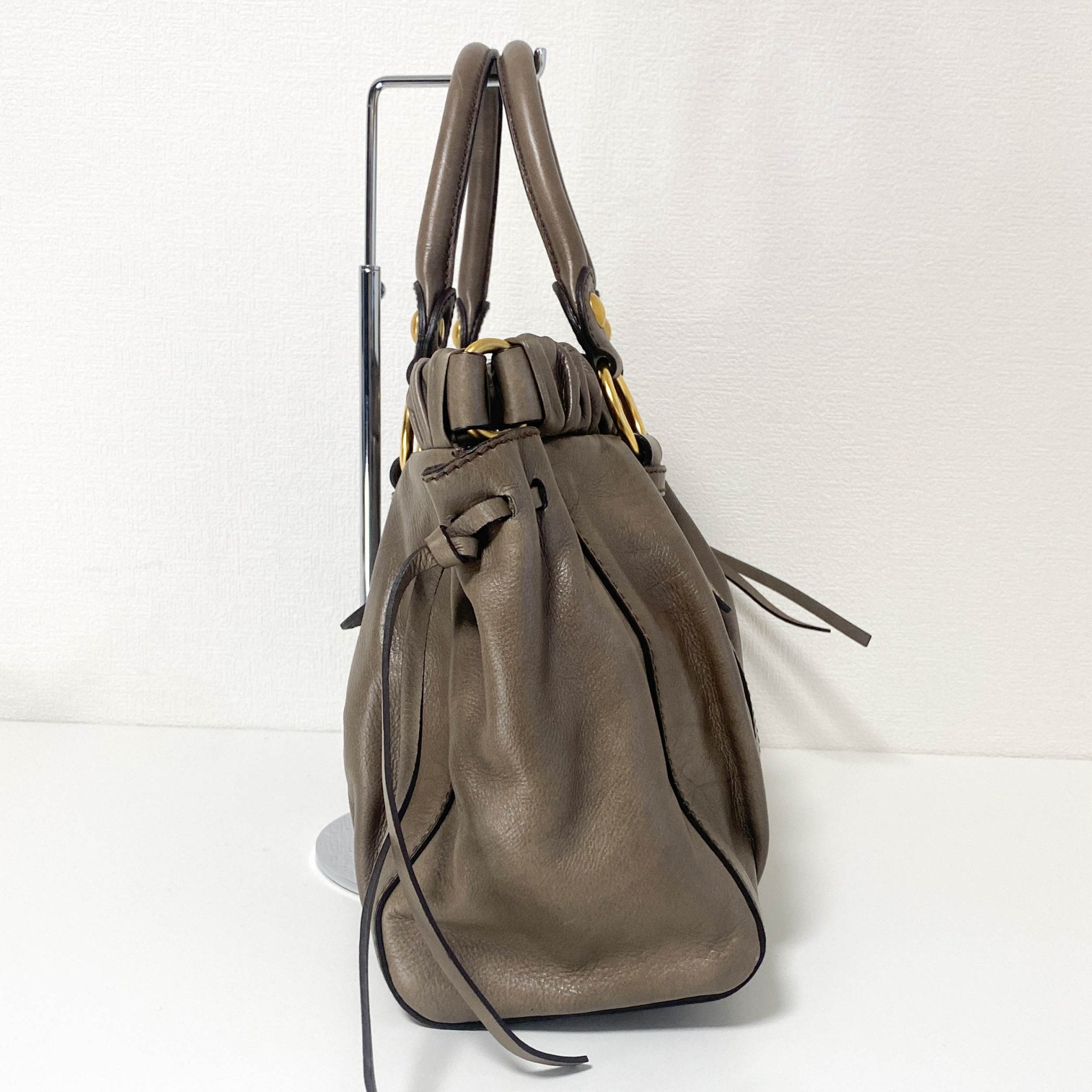 MIU MIU Vitello Lux Bauletto Leather Handbag Smoke Grey, in , Sold by HIVE PRELOVED - Crossbody bags, Handle Bags,