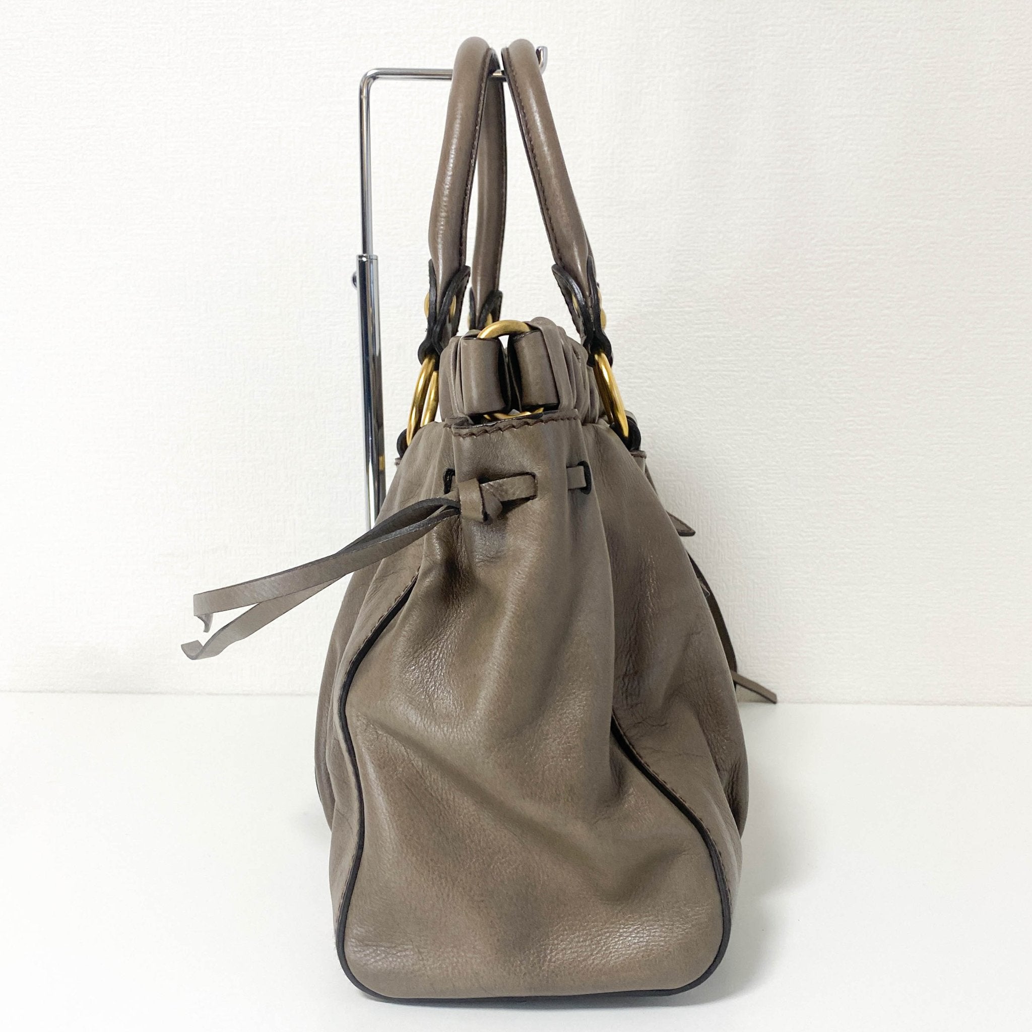 MIU MIU Vitello Lux Bauletto Leather Handbag Smoke Grey, in , Sold by HIVE PRELOVED - Crossbody bags, Handle Bags,