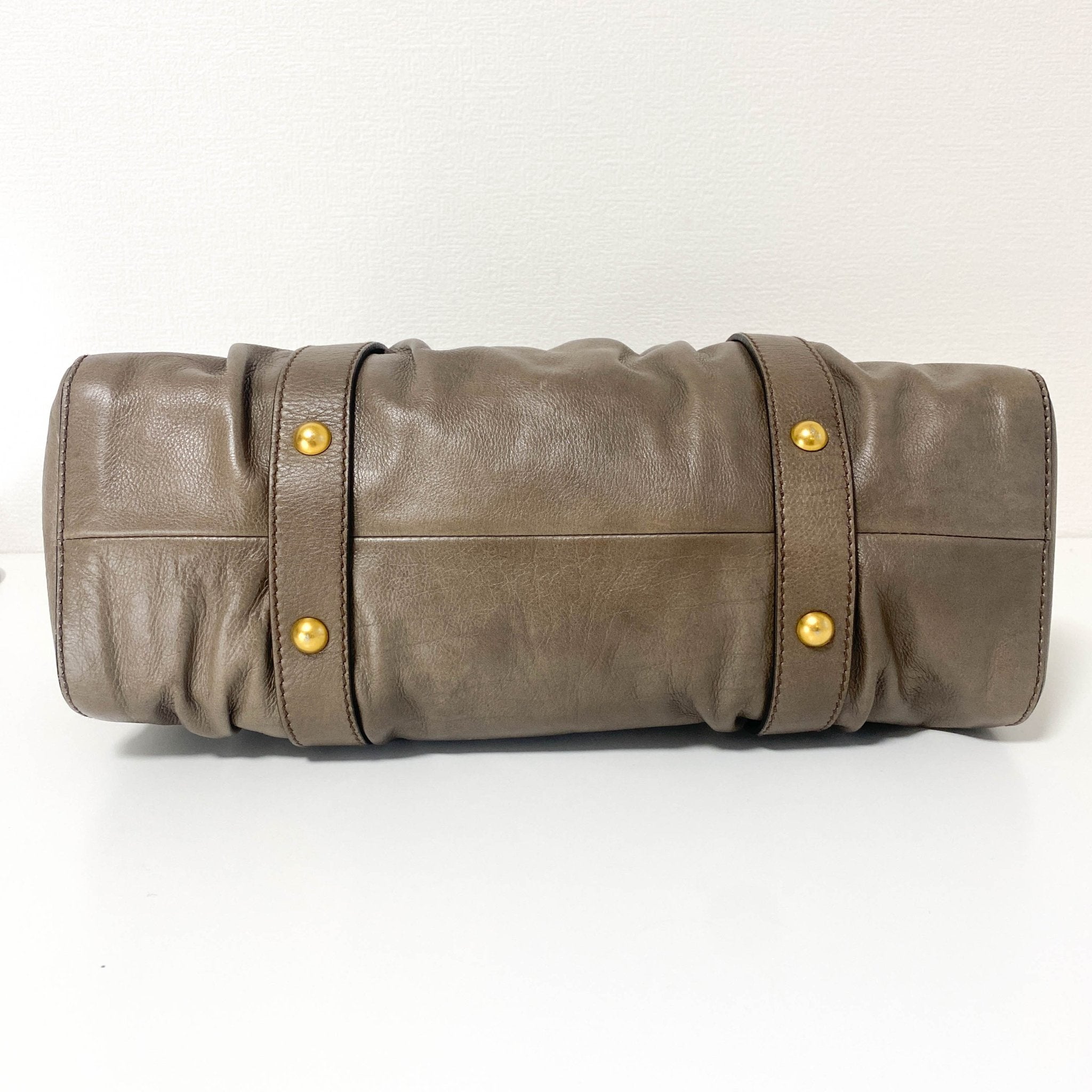 MIU MIU Vitello Lux Bauletto Leather Handbag Smoke Grey, in , Sold by HIVE PRELOVED - Crossbody bags, Handle Bags,