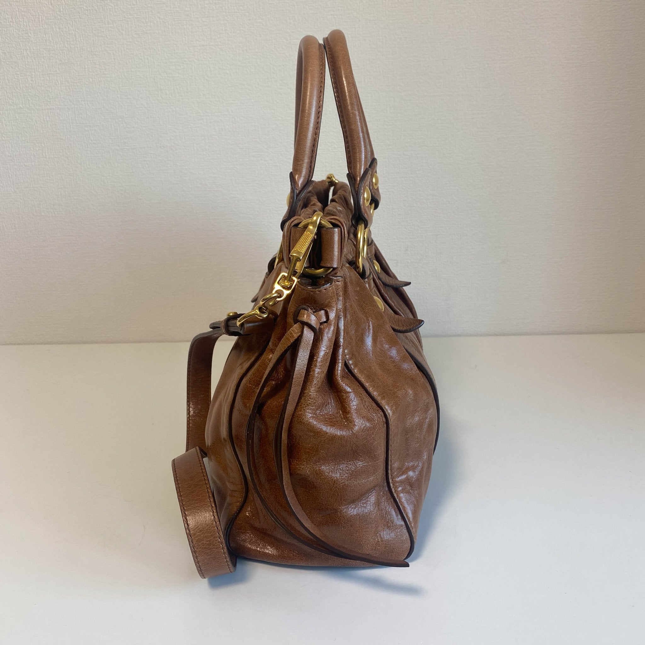 MIU MIU Vitello Luxe Brown Leather Hand Bag, in , Sold by HIVE PRELOVED - Crossbody bags, Handle Bags,