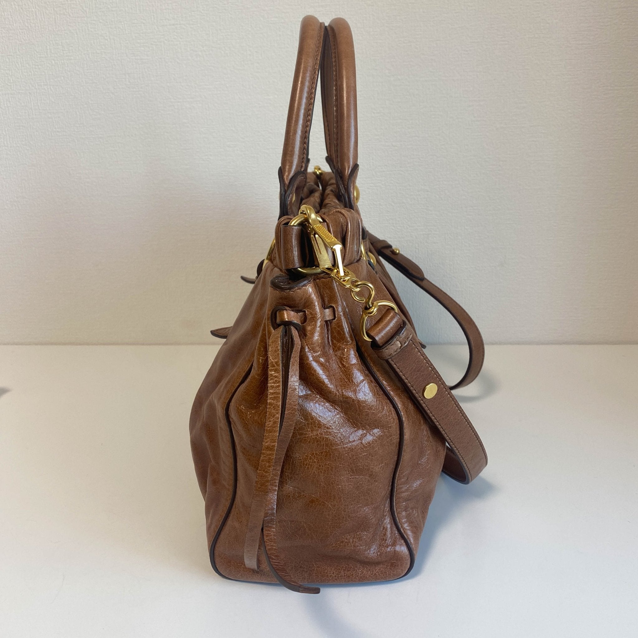 MIU MIU Vitello Luxe Brown Leather Hand Bag, in , Sold by HIVE PRELOVED - Crossbody bags, Handle Bags,