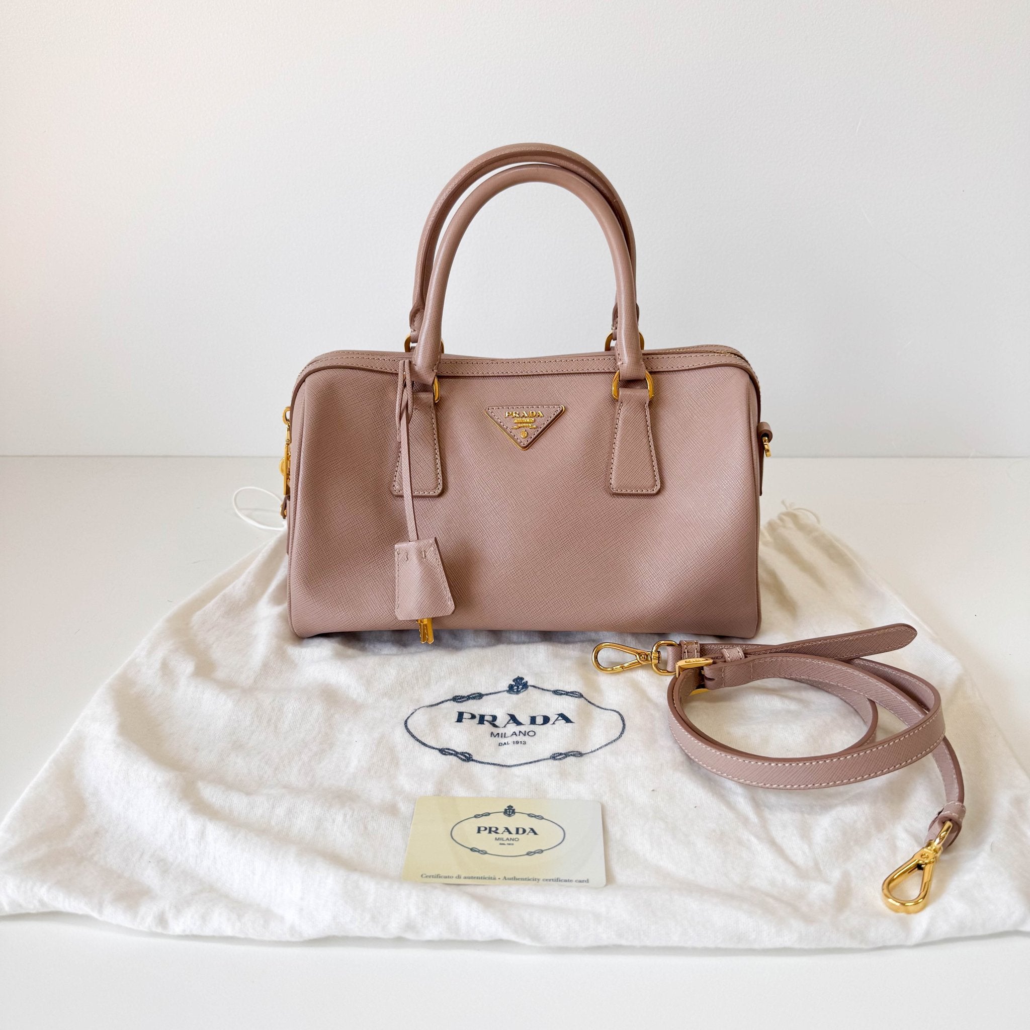 PRADA Beige Pink Leather Top Handle Bag, in , Sold by HIVE PRELOVED - Handle Bags, Shoulder Bags,