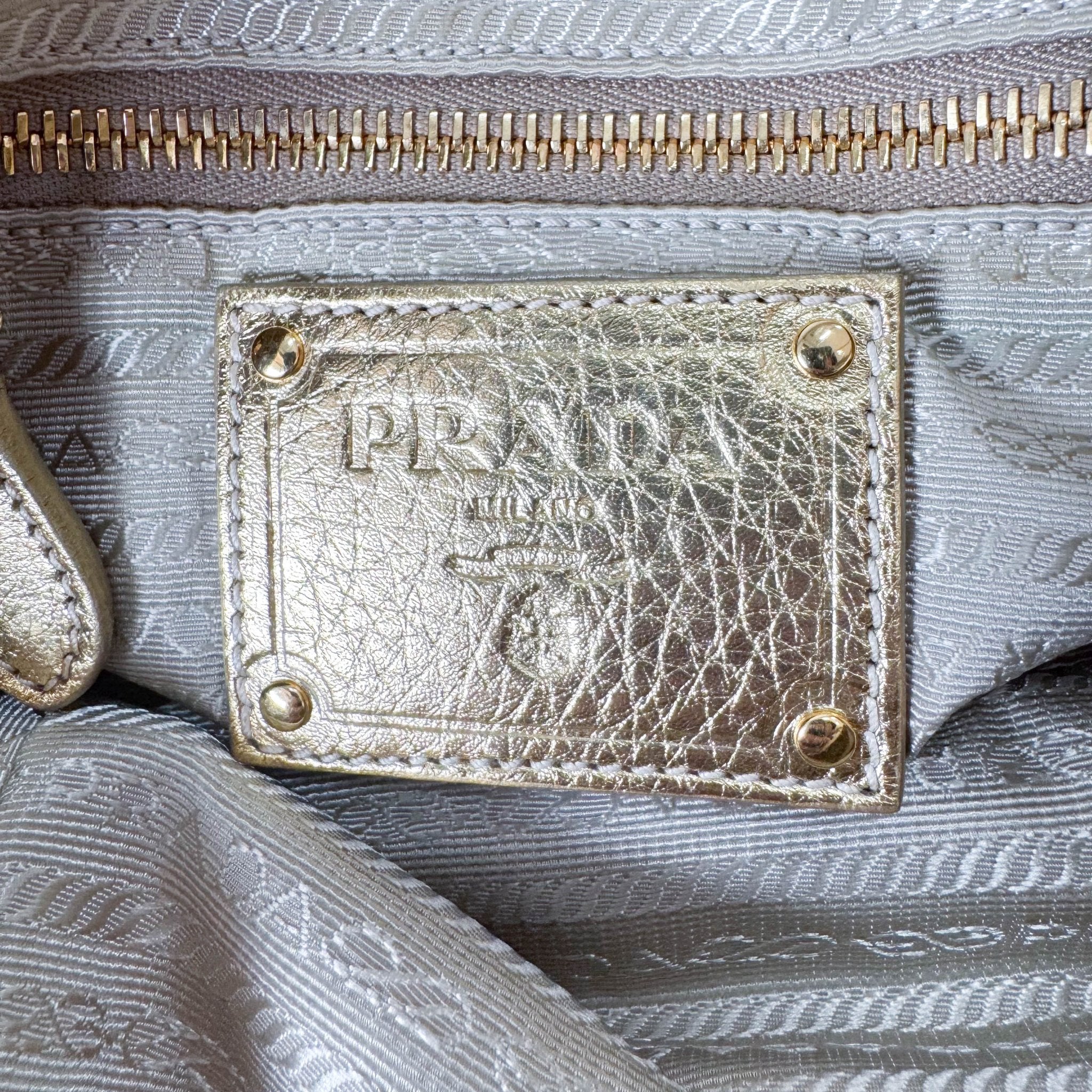 PRADA Bow Gold Leather and Nylon Hand Bag, in , Sold by HIVE PRELOVED - Handle Bags, ,