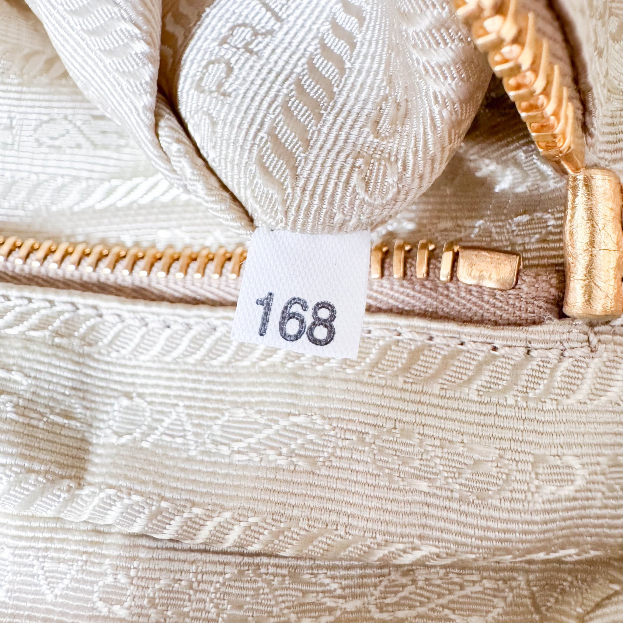 PRADA Bow Gold Leather and Nylon Hand Bag, in , Sold by HIVE PRELOVED - Handle Bags, ,