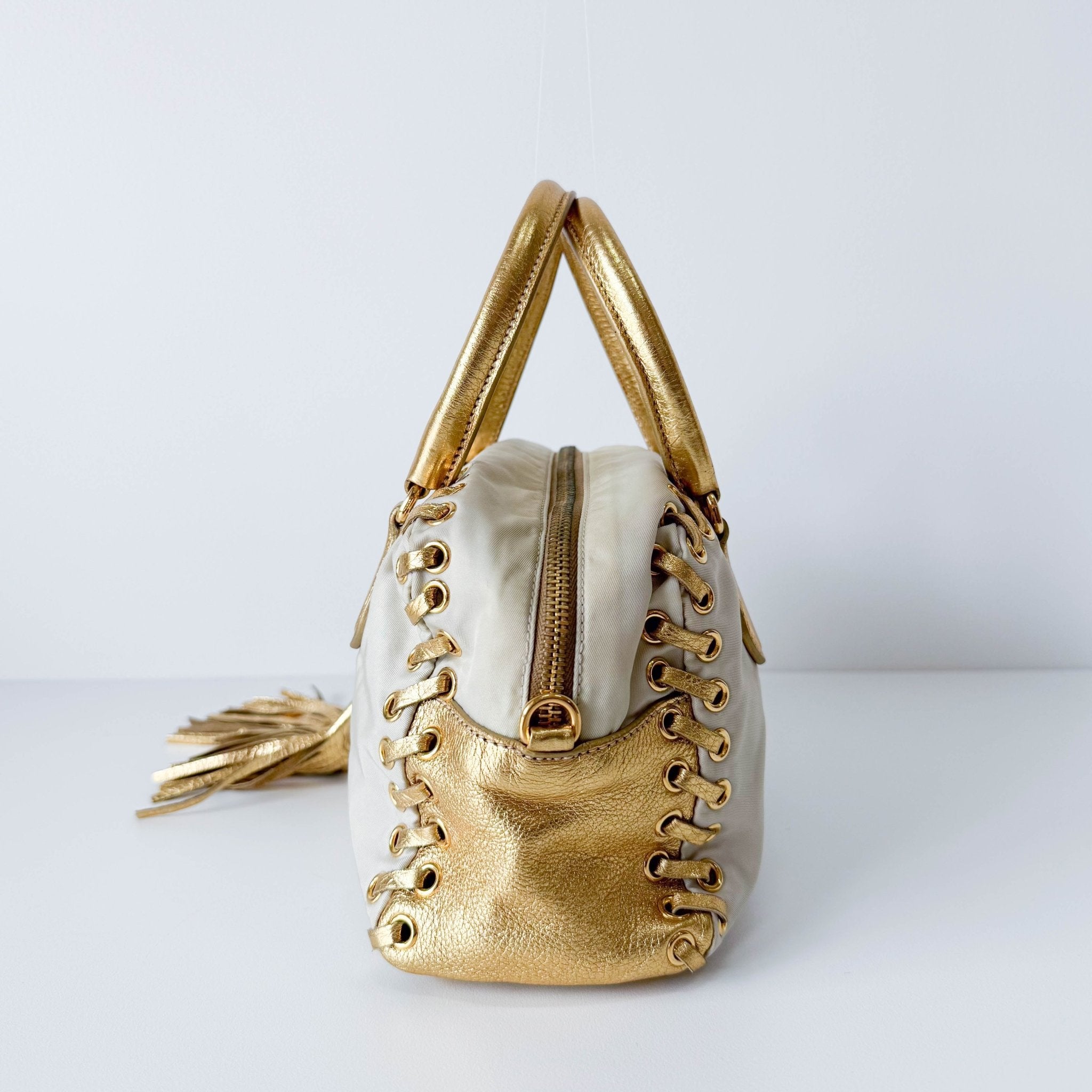 PRADA Bow Gold Leather and Nylon Hand Bag, in , Sold by HIVE PRELOVED - Handle Bags, ,