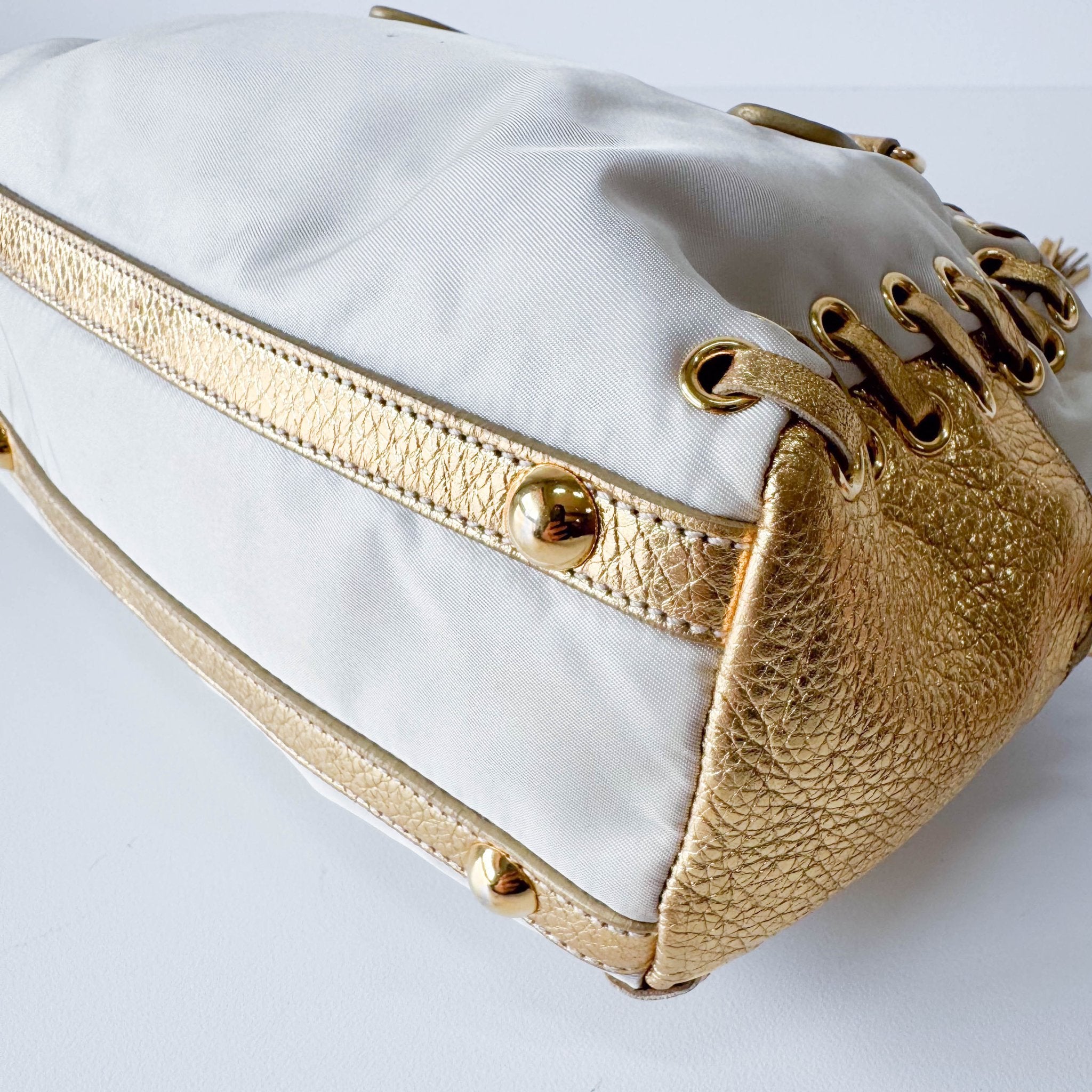 PRADA Bow Gold Leather and Nylon Hand Bag, in , Sold by HIVE PRELOVED - Handle Bags, ,