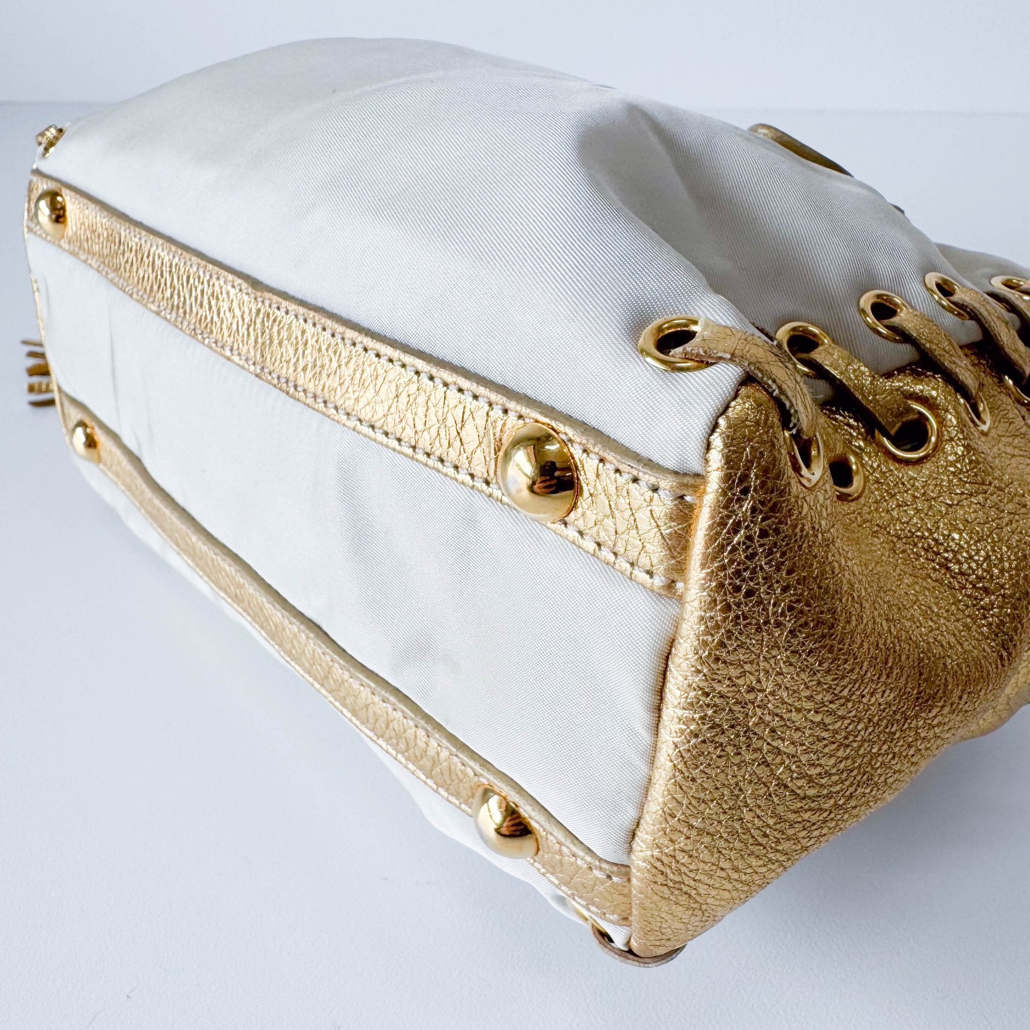 PRADA Bow Gold Leather and Nylon Hand Bag, in , Sold by HIVE PRELOVED - Handle Bags, ,