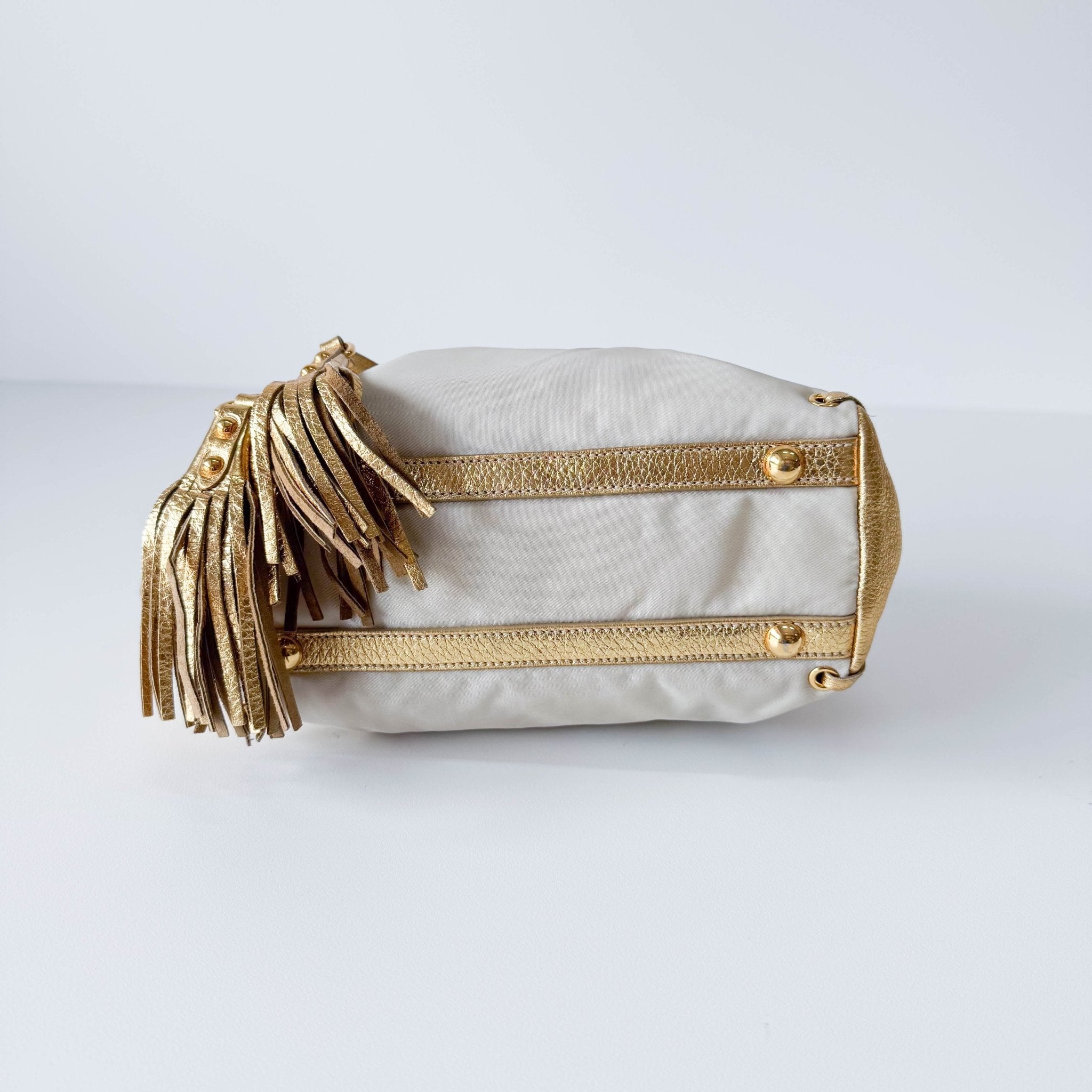 PRADA Bow Gold Leather and Nylon Hand Bag, in , Sold by HIVE PRELOVED - Handle Bags, ,