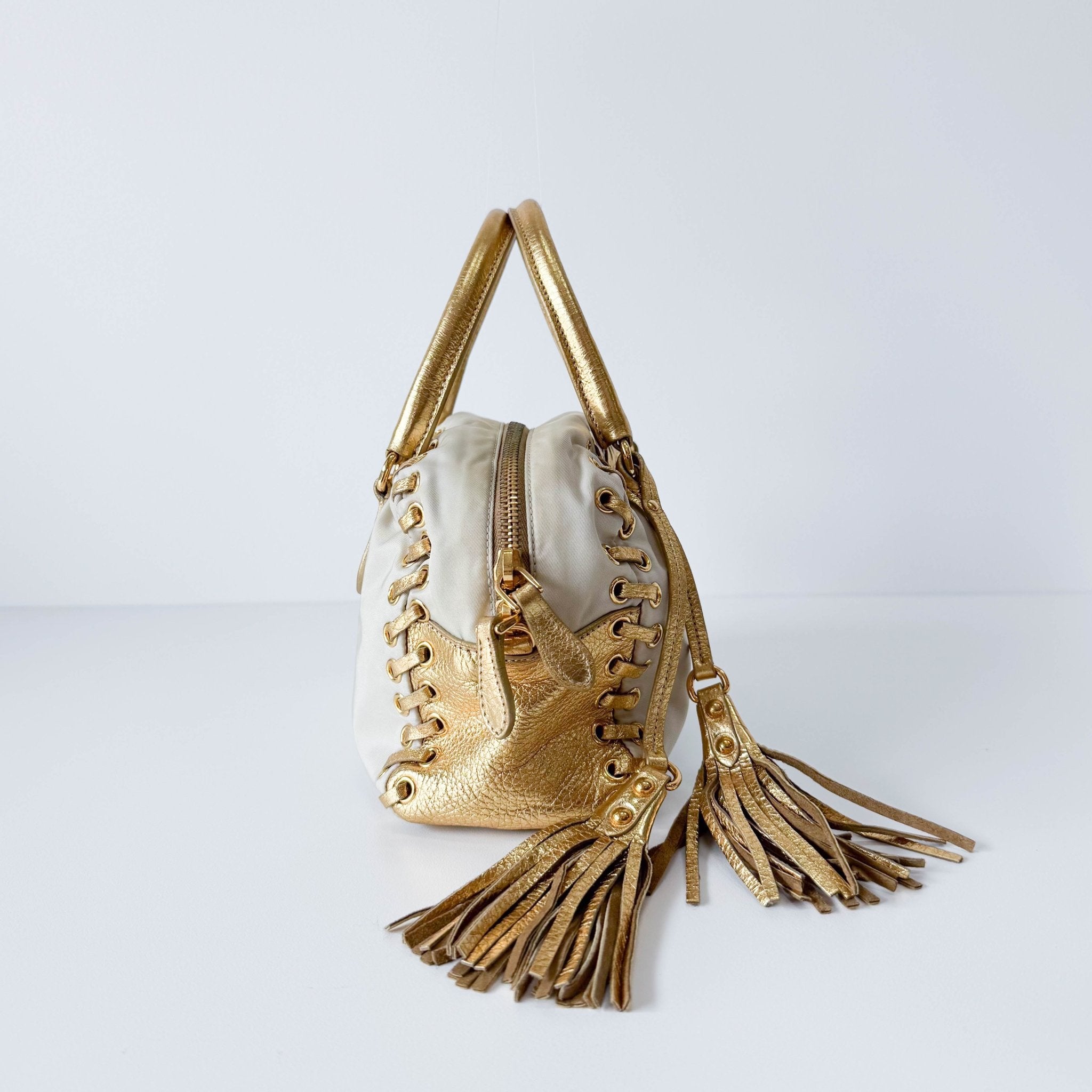 PRADA Bow Gold Leather and Nylon Hand Bag, in , Sold by HIVE PRELOVED - Handle Bags, ,