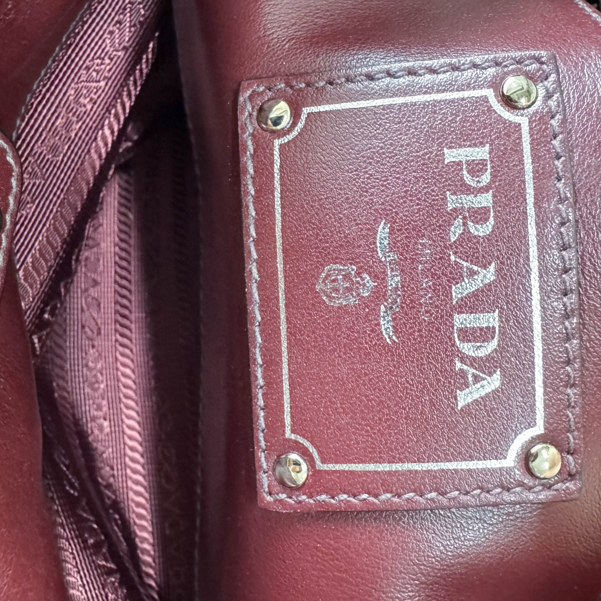 PRADA Burgundy Leather Top Handle Bag, in , Sold by HIVE PRELOVED - Handle Bags, ,