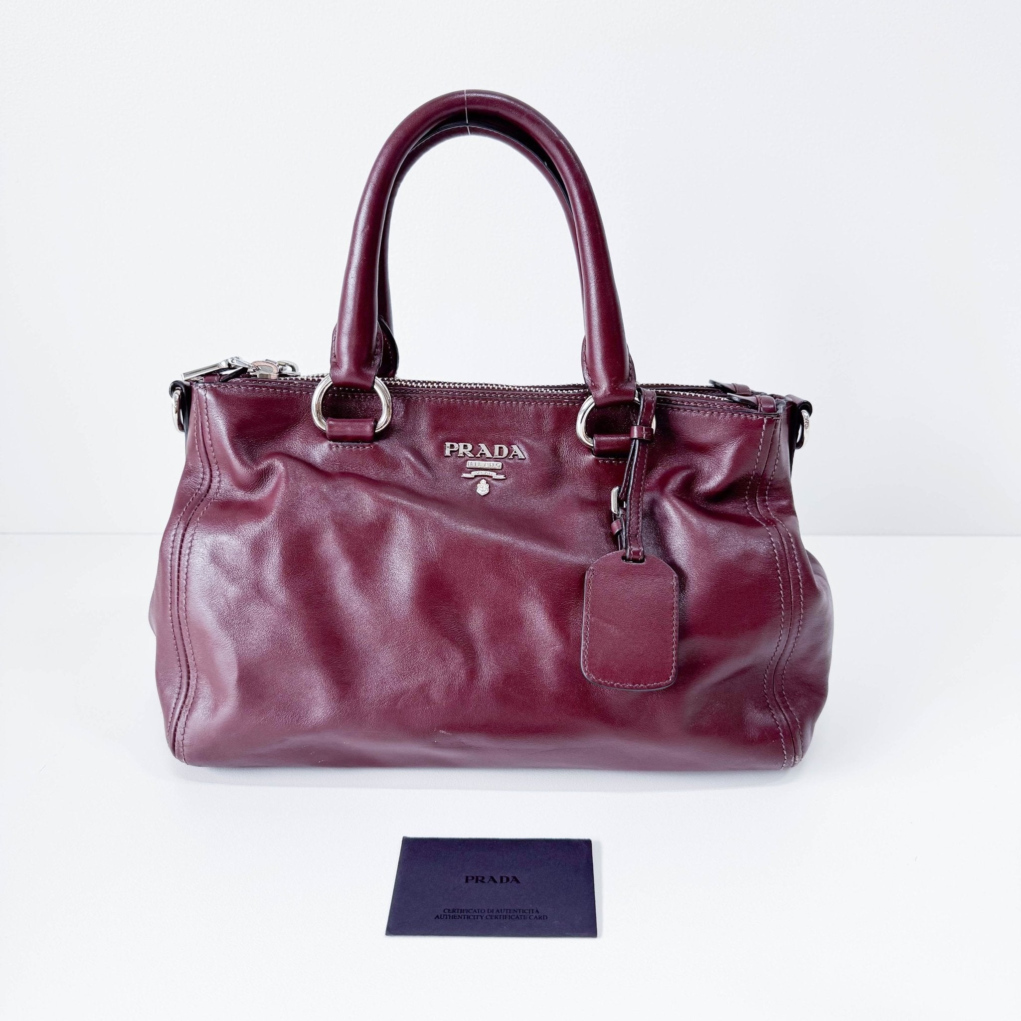 PRADA Burgundy Leather Top Handle Bag, in , Sold by HIVE PRELOVED - Handle Bags, ,