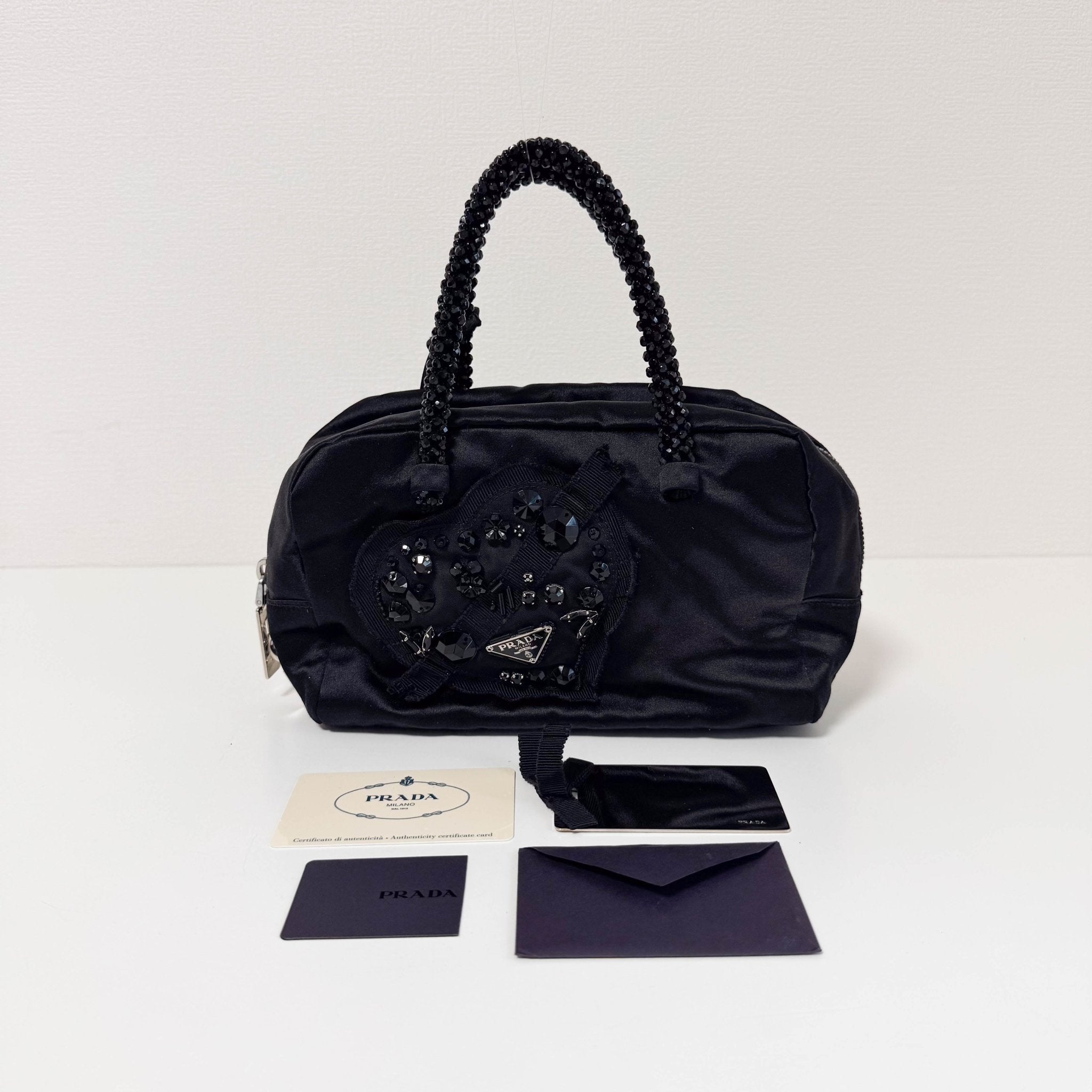 PRADA Evening bear Bijoux Bags Hand Bag Satin / Leather Black, in , Sold by HIVE PRELOVED - Handle Bags, Mini bags,