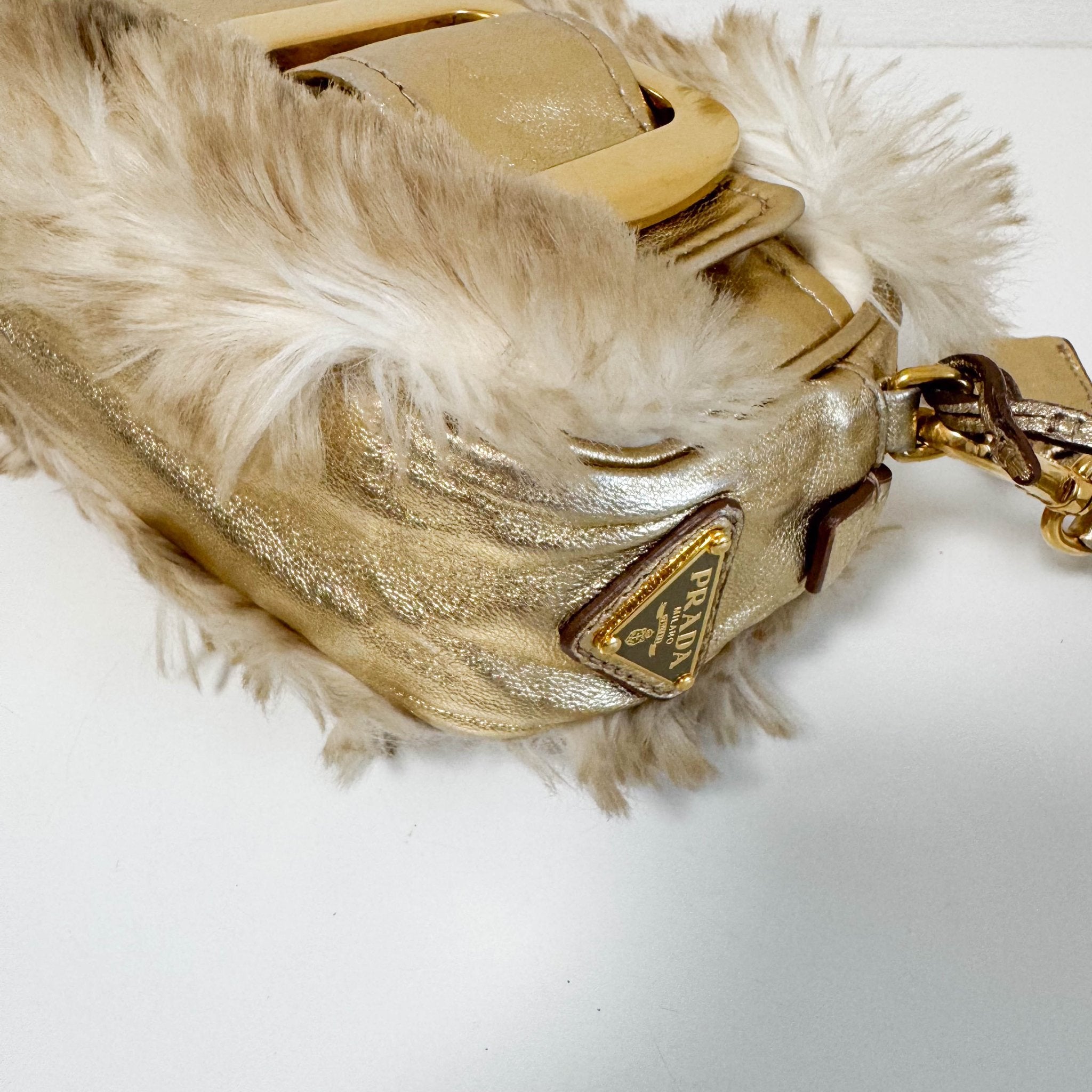 PRADA Faux Fur Gold Leather Shoulder Bag, in , Sold by HIVE PRELOVED - Crossbody bags, Shoulder Bags,