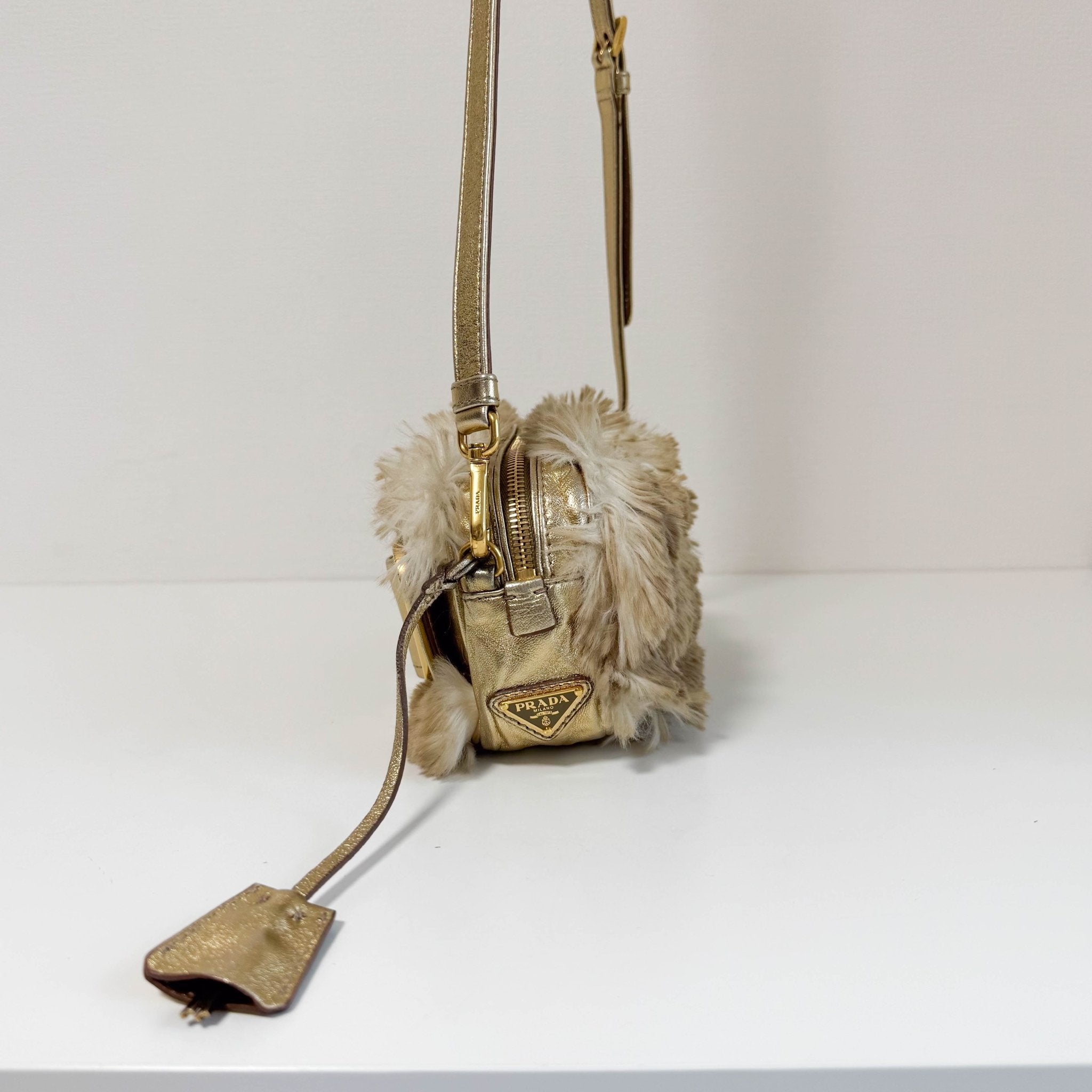 PRADA Faux Fur Gold Leather Shoulder Bag, in , Sold by HIVE PRELOVED - Crossbody bags, Shoulder Bags,