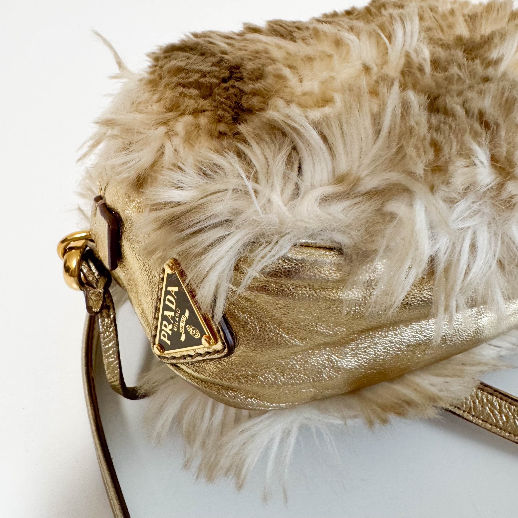 PRADA Faux Fur Gold Leather Shoulder Bag, in , Sold by HIVE PRELOVED - Crossbody bags, Shoulder Bags,