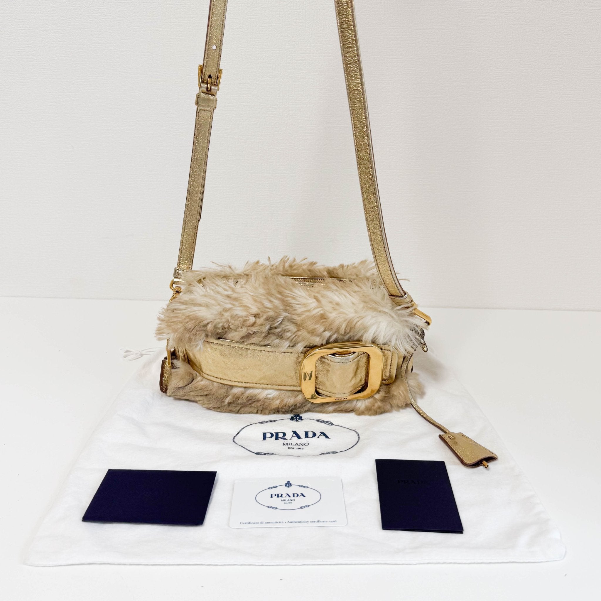 PRADA Faux Fur Gold Leather Shoulder Bag, in , Sold by HIVE PRELOVED - Crossbody bags, Shoulder Bags,