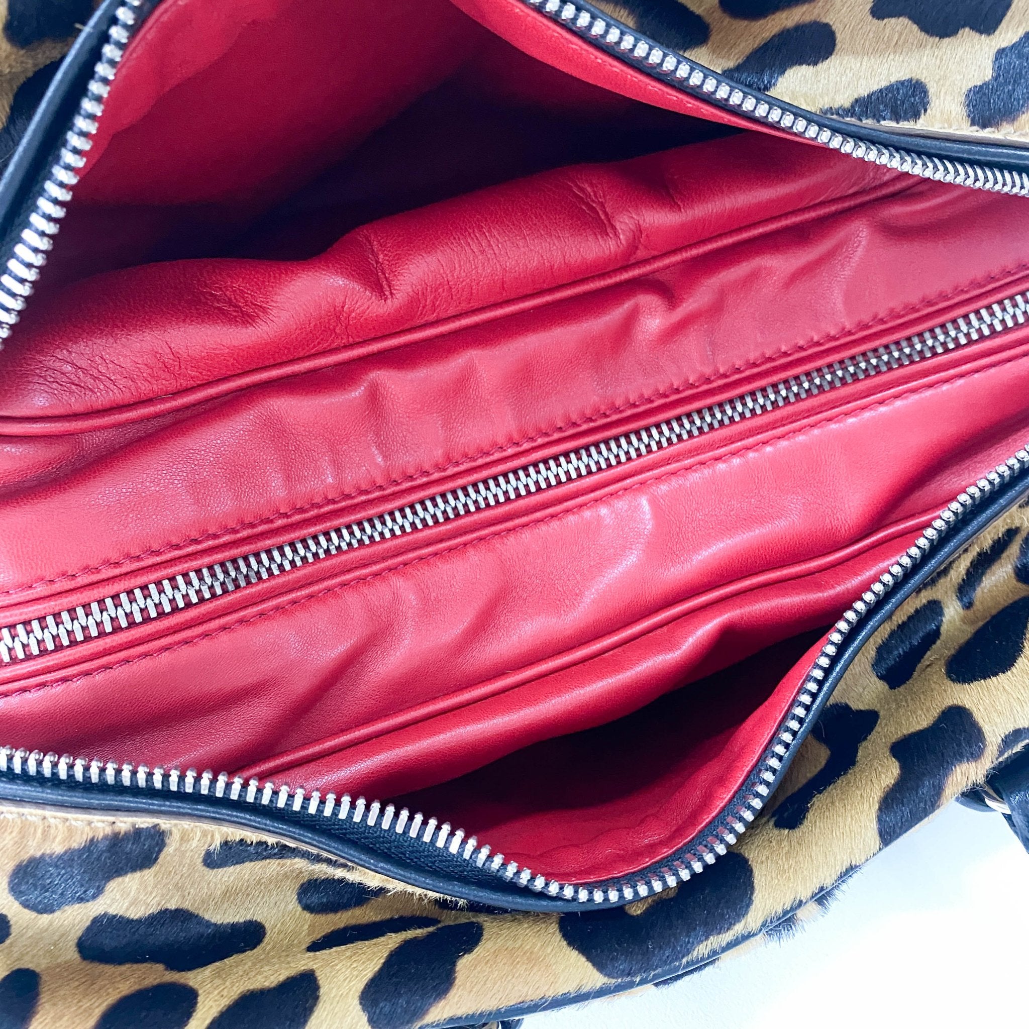 PRADA Leopard Pony Hair Top Handle Bag, in , Sold by HIVE PRELOVED - Crossbody bags, Shoulder Bags,
