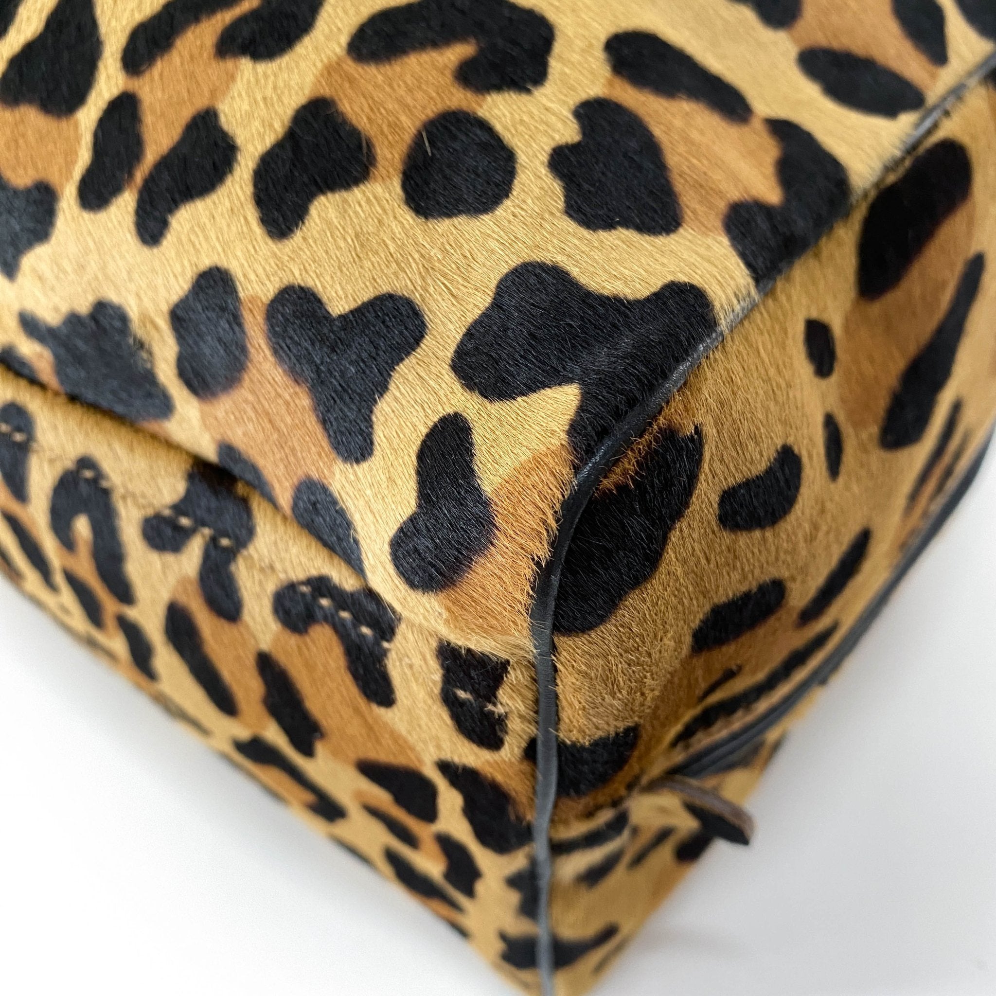 PRADA Leopard Pony Hair Top Handle Bag, in , Sold by HIVE PRELOVED - Crossbody bags, Shoulder Bags,