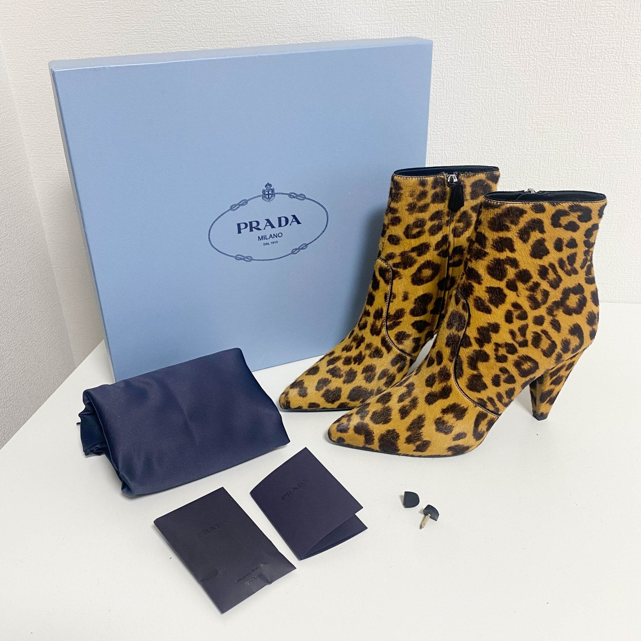 PRADA Leopard Print Pony Hair Boots, in , Sold by HIVE PRELOVED - Boots, ,