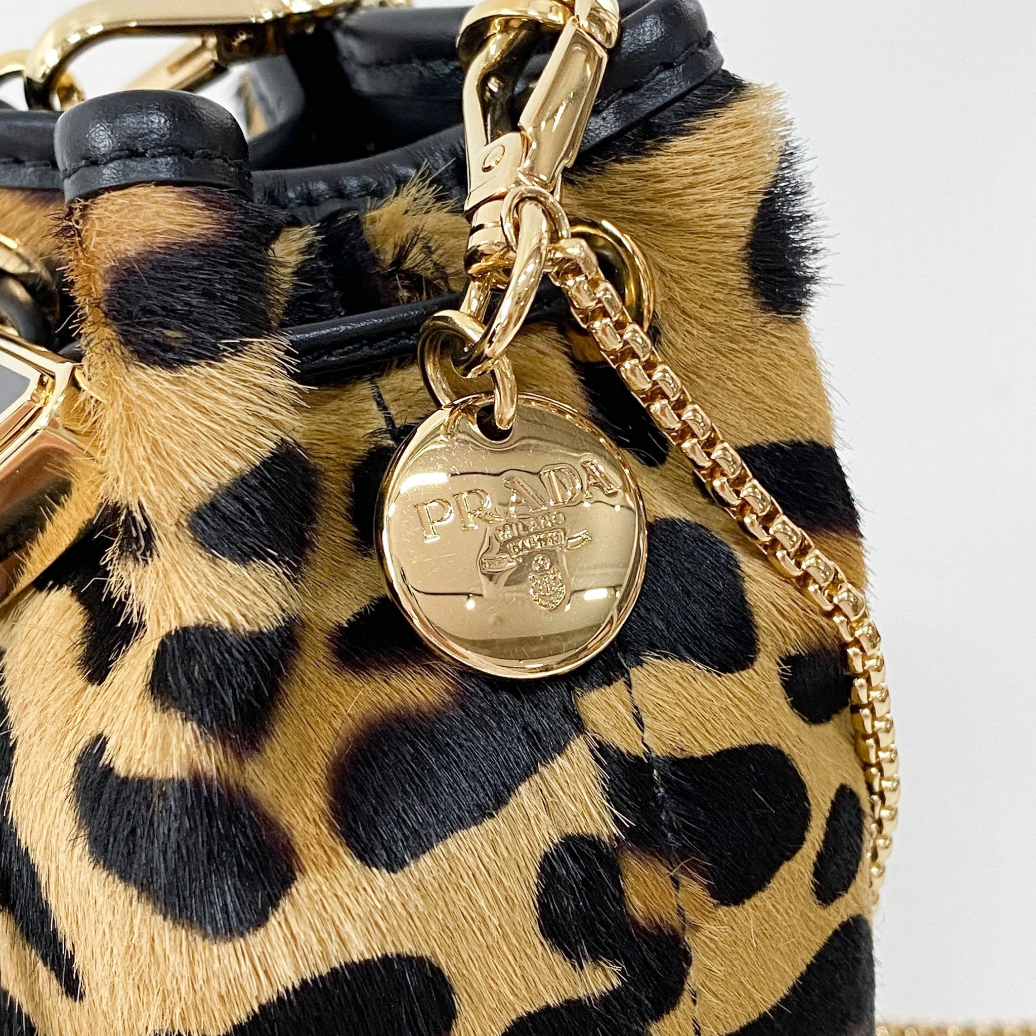 PRADA Mini Pouch Bag Leopard Print Pony Hair, in , Sold by HIVE PRELOVED - Pouches, Shoulder Bags,