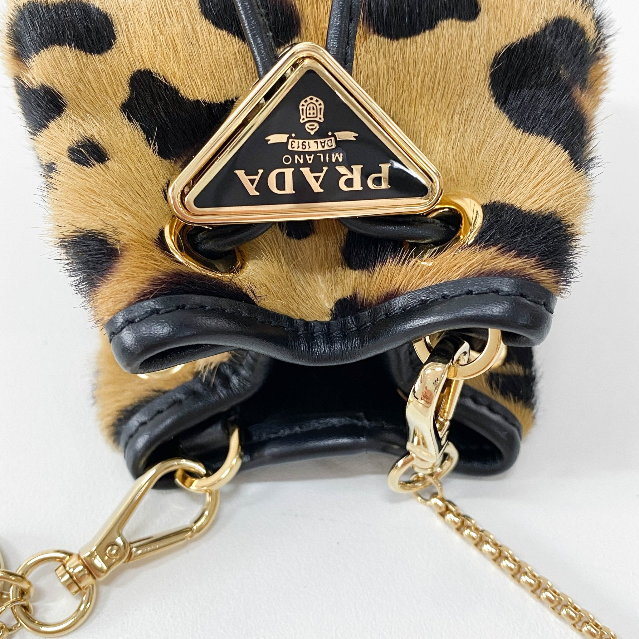 PRADA Mini Pouch Bag Leopard Print Pony Hair, in , Sold by HIVE PRELOVED - Pouches, Shoulder Bags,