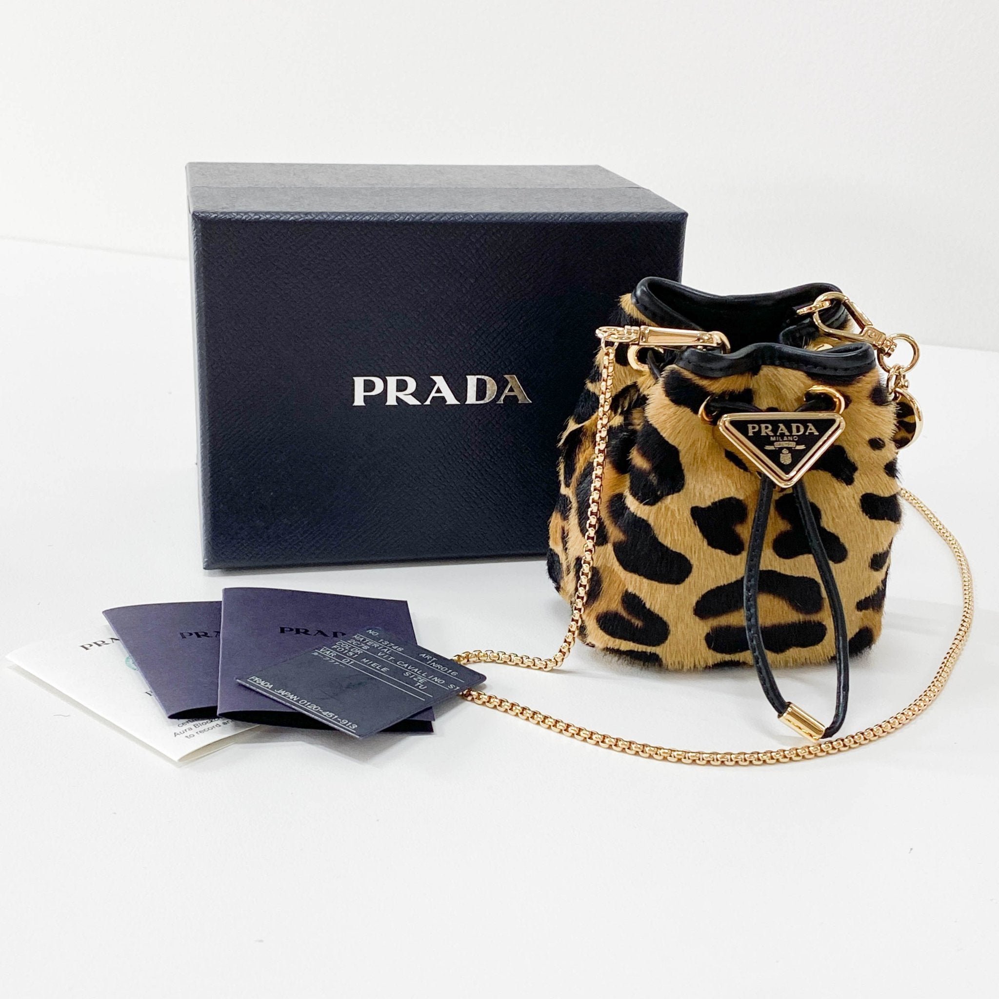 PRADA Mini Pouch Bag Leopard Print Pony Hair, in , Sold by HIVE PRELOVED - Pouches, Shoulder Bags,