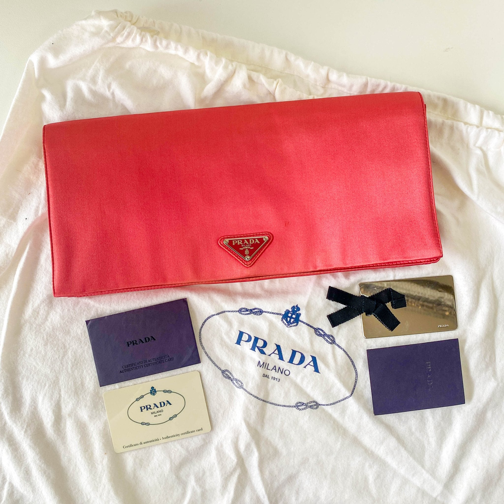 PRADA Satin Magenta Clutch Bag, in , Sold by HIVE PRELOVED - Clutch bags, ,