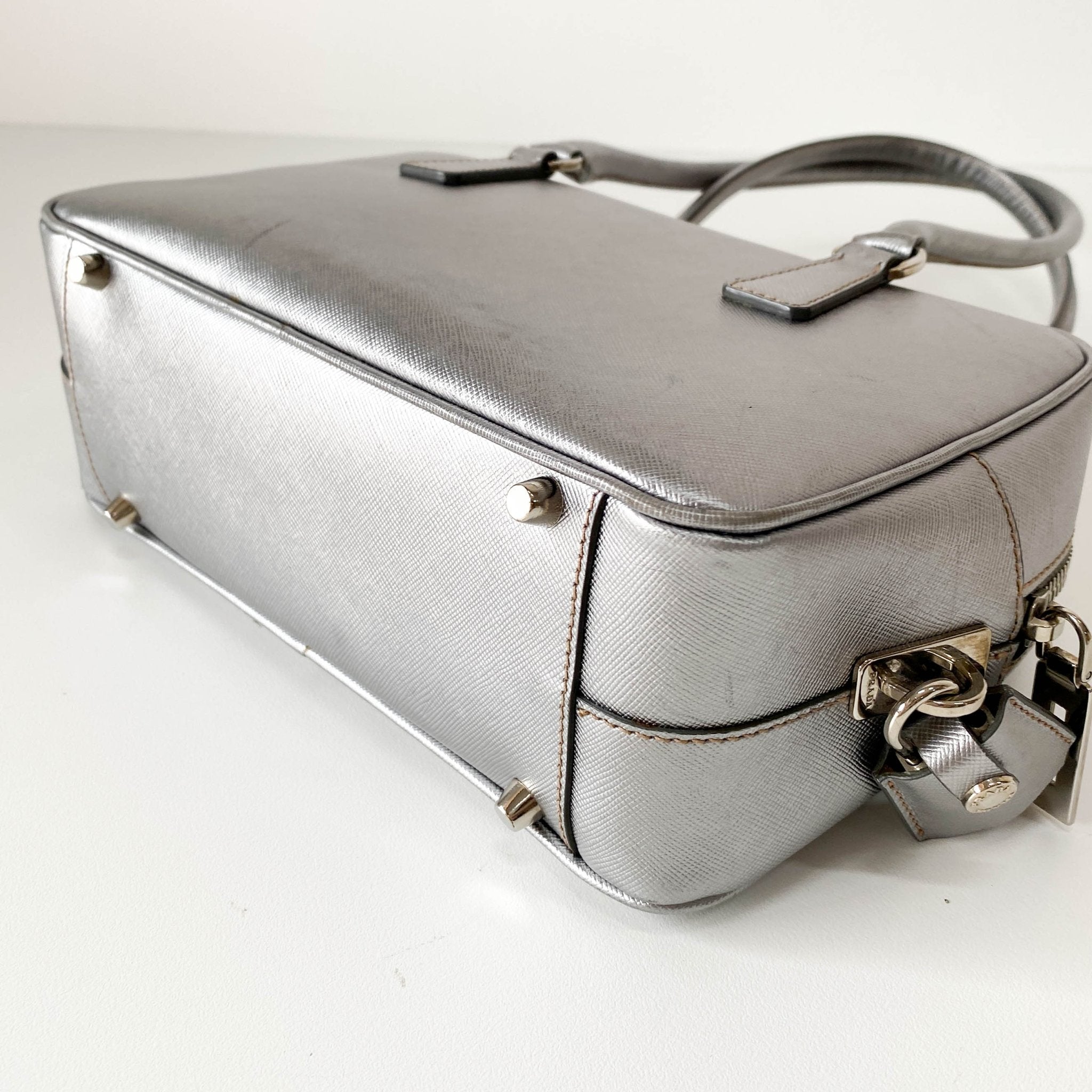 PRADA Silver Clochard Key & Lock Shoulder Bag, in , Sold by HIVE PRELOVED - Shoulder Bags, ,