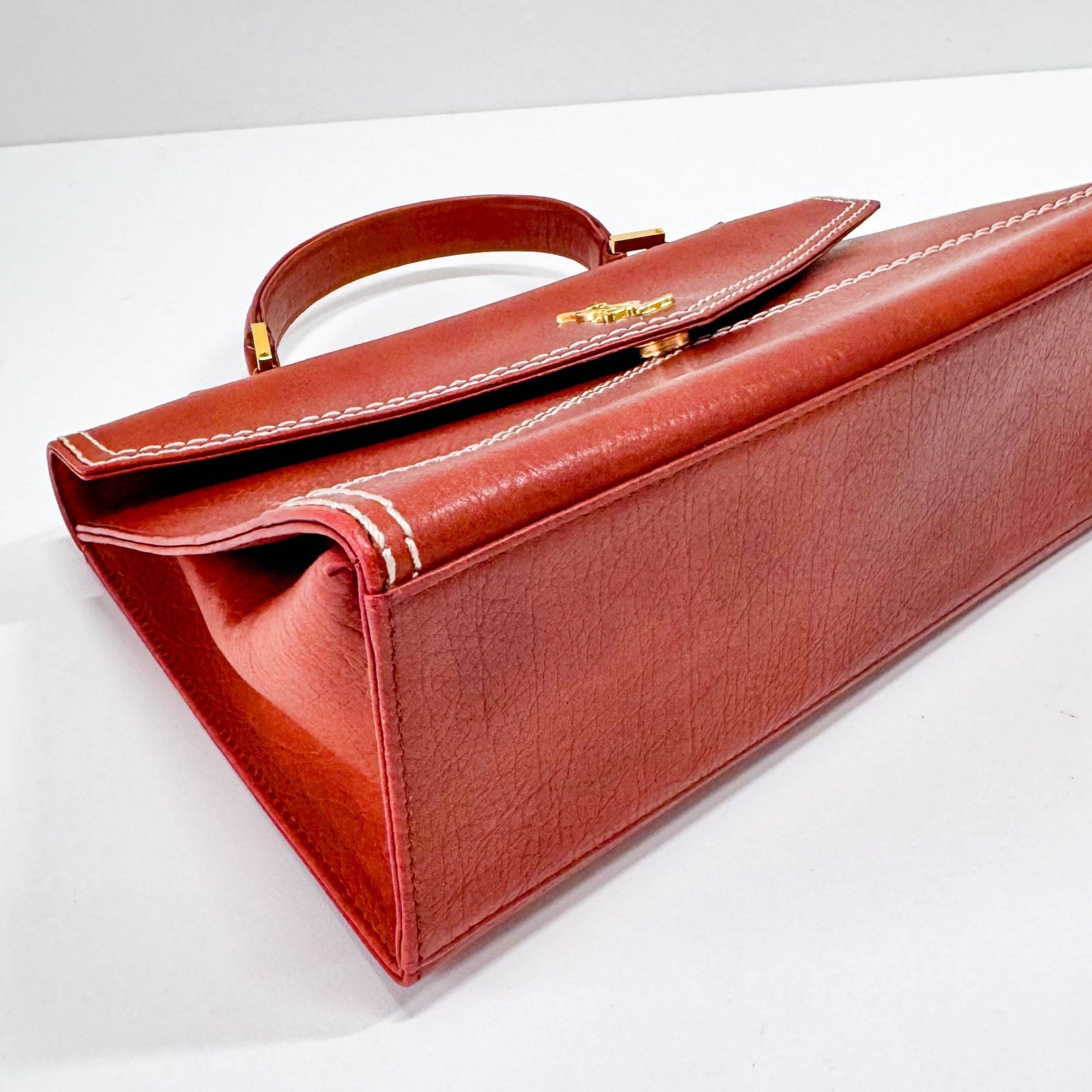 SAINT LAURENT Burnt Orange Leather Envelope Handle Bag, in , Sold by HIVE PRELOVED - Handle Bags, ,